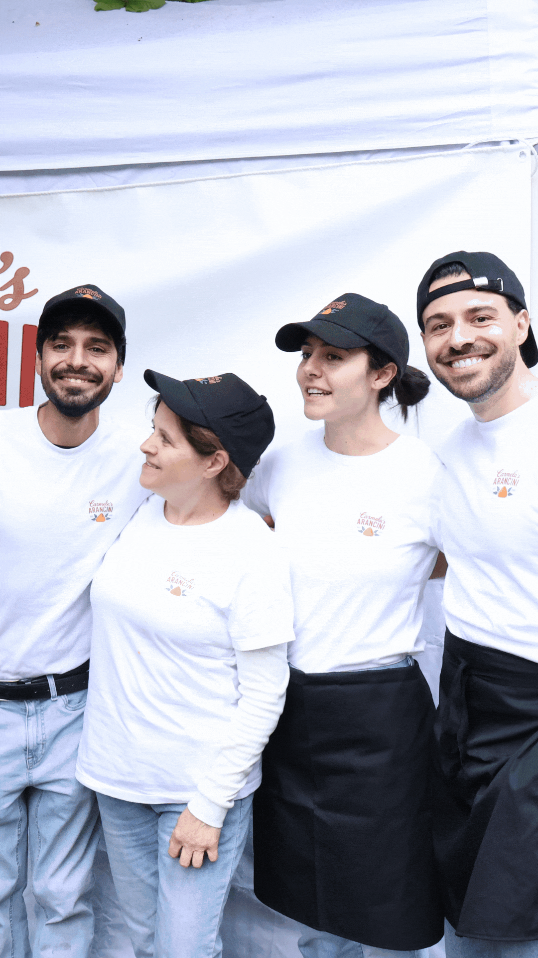The Carmela's Arancini family at the market